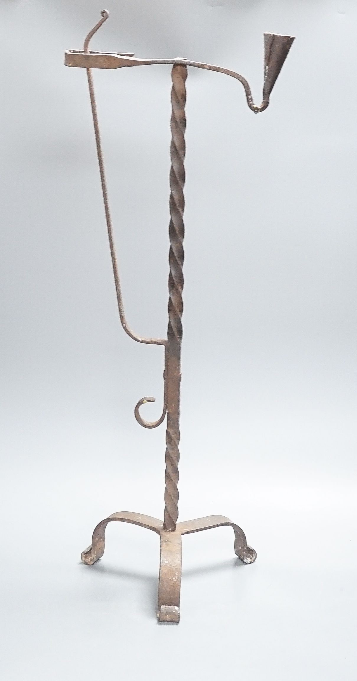 A 17th / 18th century wrought iron candle rushlight holder 68cm